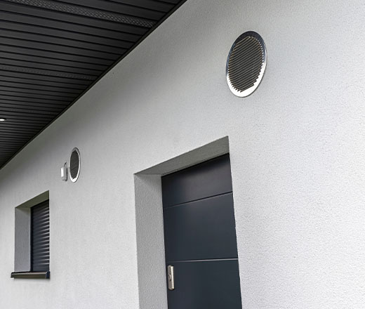 an air intake and exhaust valve on the front of a bungalow